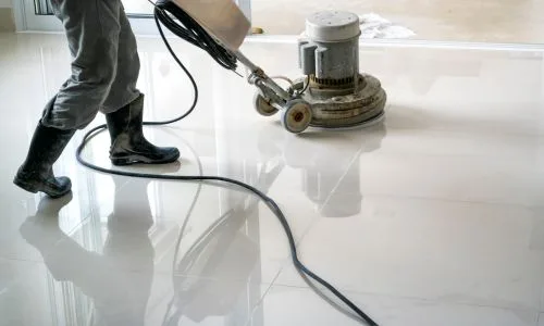 Deep cleaning experts scrubbing floors and windows in Hamilton.