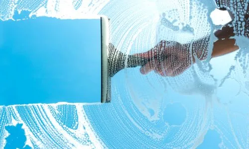 Deep cleaning experts scrubbing floors and windows in Hamilton.